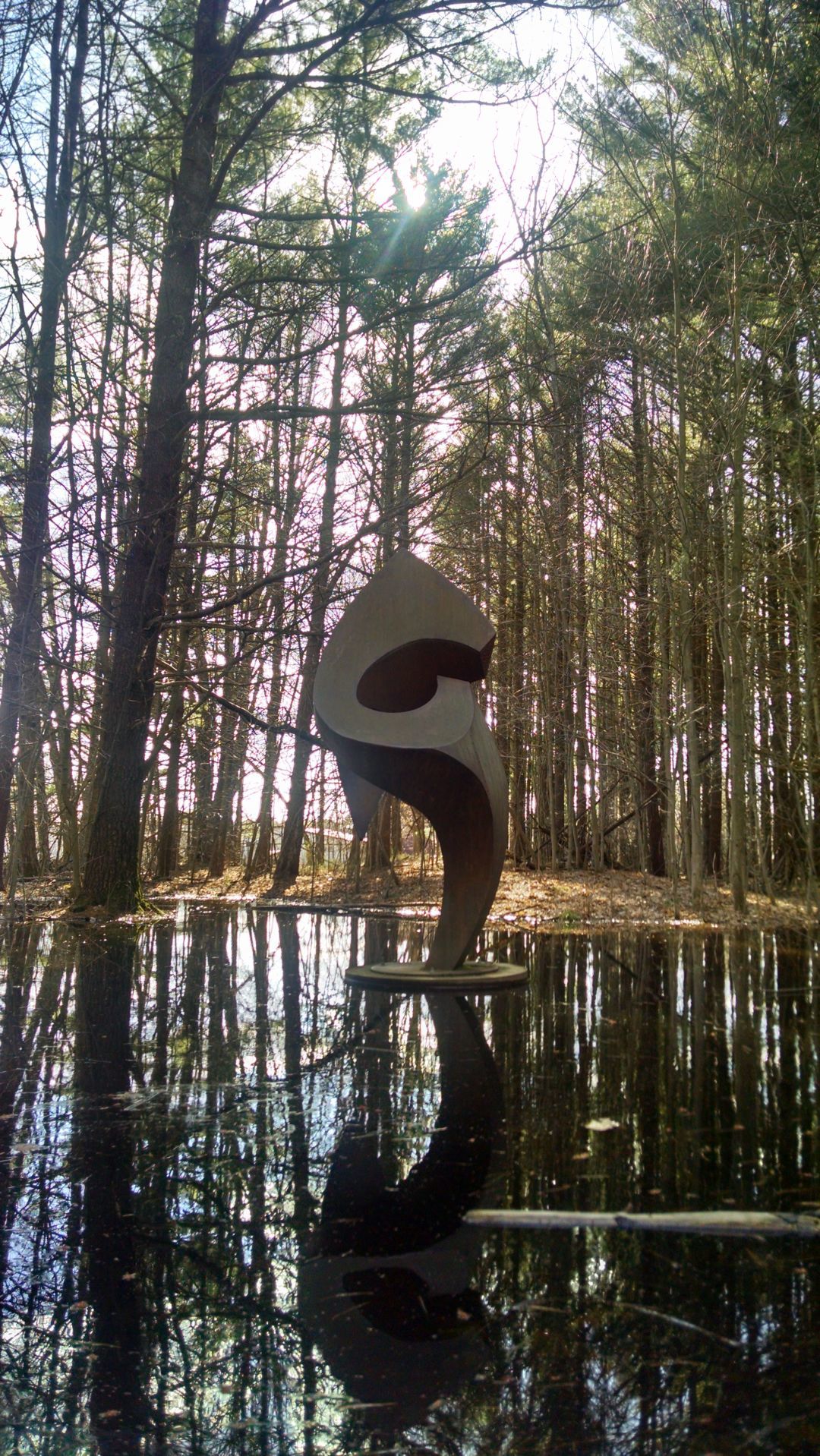 Flooded area around sculpture during spring thaw